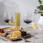 SC Hospitality Ivento Tritan crystal wine glasses and champagne flute set on a wooden serving board with cheese