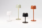 SC Hospitality Ailati 1+1 table lamps in white, sage green, black, and terracotta finishes on a white background.
