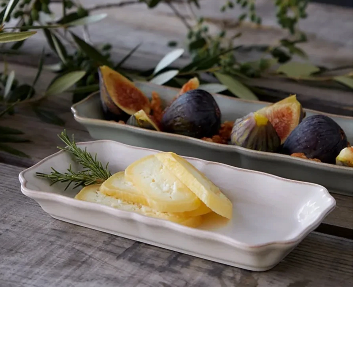 SC Hospitality Alentejo white rectangular ceramic tray holding sliced cheese on a rustic wooden table with figs