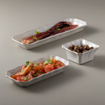 SC Hospitality white rectangular Alentejo ceramic tray holding grilled octopus and tomato salad on a grey background