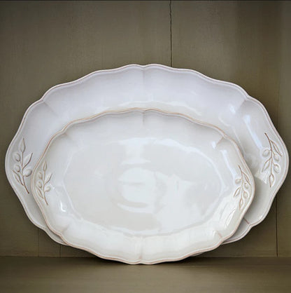 SC Hospitality Alentejo white stoneware oval platters with wavy edges and hand-painted leaf detail