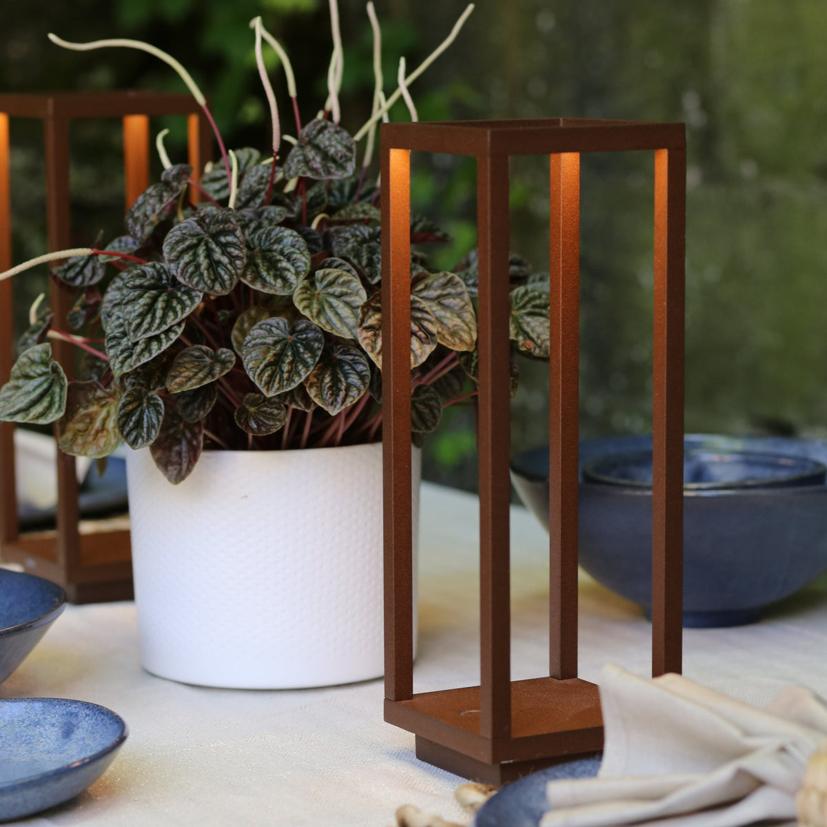 SC Hospitality Home Lantern in corten finish, a portable, rechargeable, and dimmable LED table lamp for indoor-outdoor