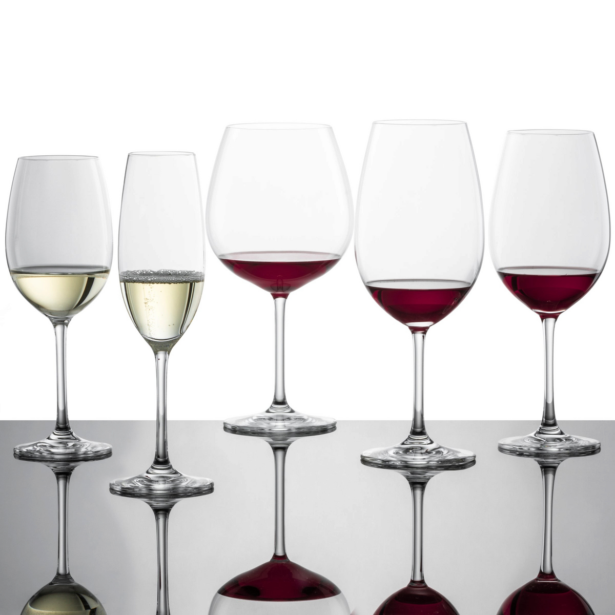 SC Hospitality Ivento collection of five lead-free Tritan crystal wine glasses with red and white wine on a surface.