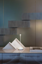 SC Hospitality Pina white cordless rechargeable table lamp with a sleek minimalist design on a modern surface
