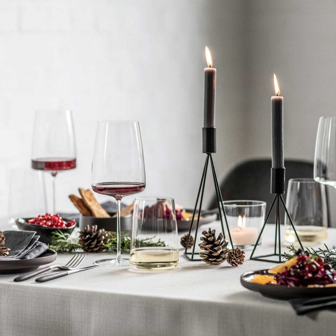 SC Hospitality Sensa crystal wine glass on a modern dining table with candles and festive decor