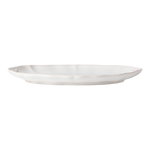 SC Hospitality Costa Nova Alentejo white stoneware oval platter with hand-painted wavy rim, 32cm wide.