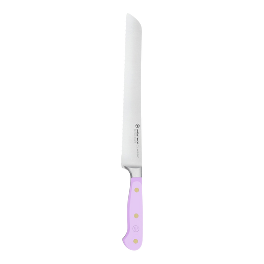 SC Hospitality Wüsthof 23cm double serrated bread knife with a purple yam synthetic handle and stainless steel blade.